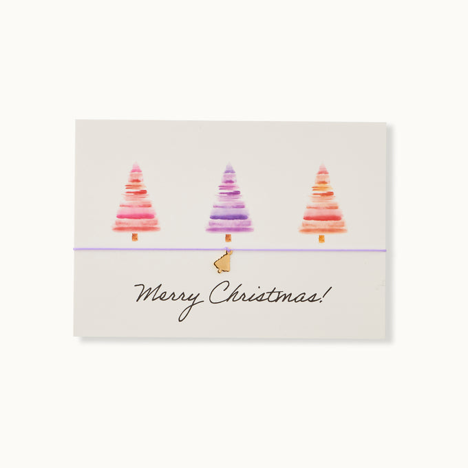 Merry Christmas! Karte mit einem Weihnachtsbaum als 18K vergoldeter Anhänger an einem dunkelgrünen Armband.
